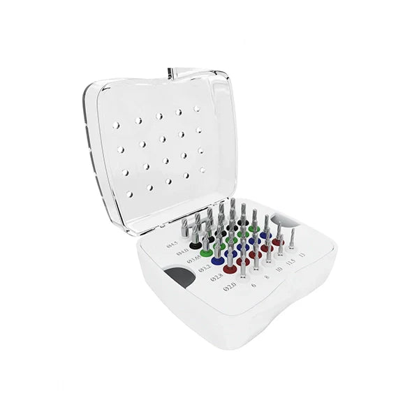 Implant drill kit with matched surgical drills and depth stoppers in a sterilizable tray.