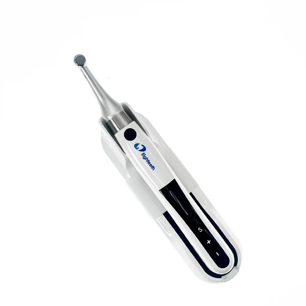 Eighteeth E-Xtreme endo motor seated in charging base, angled view